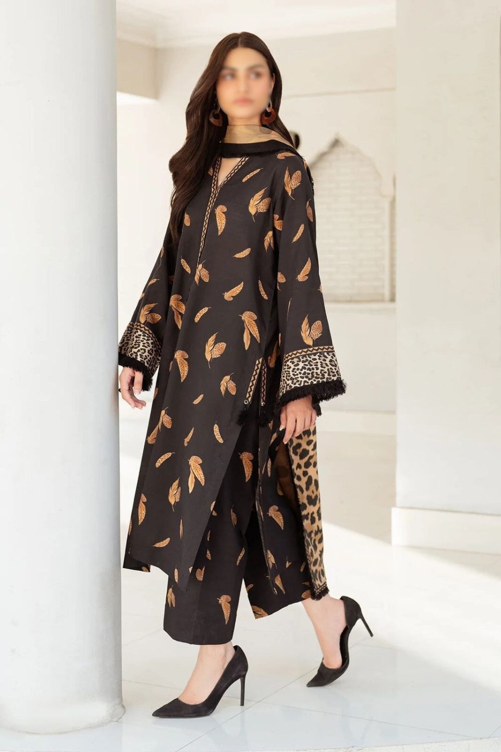 Baroque black lawn suit with feather and leopard print, styled with mustard dupatta