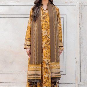 Model wearing mustard-beige Baroque embroidered suit with brown dupatta and ethnic