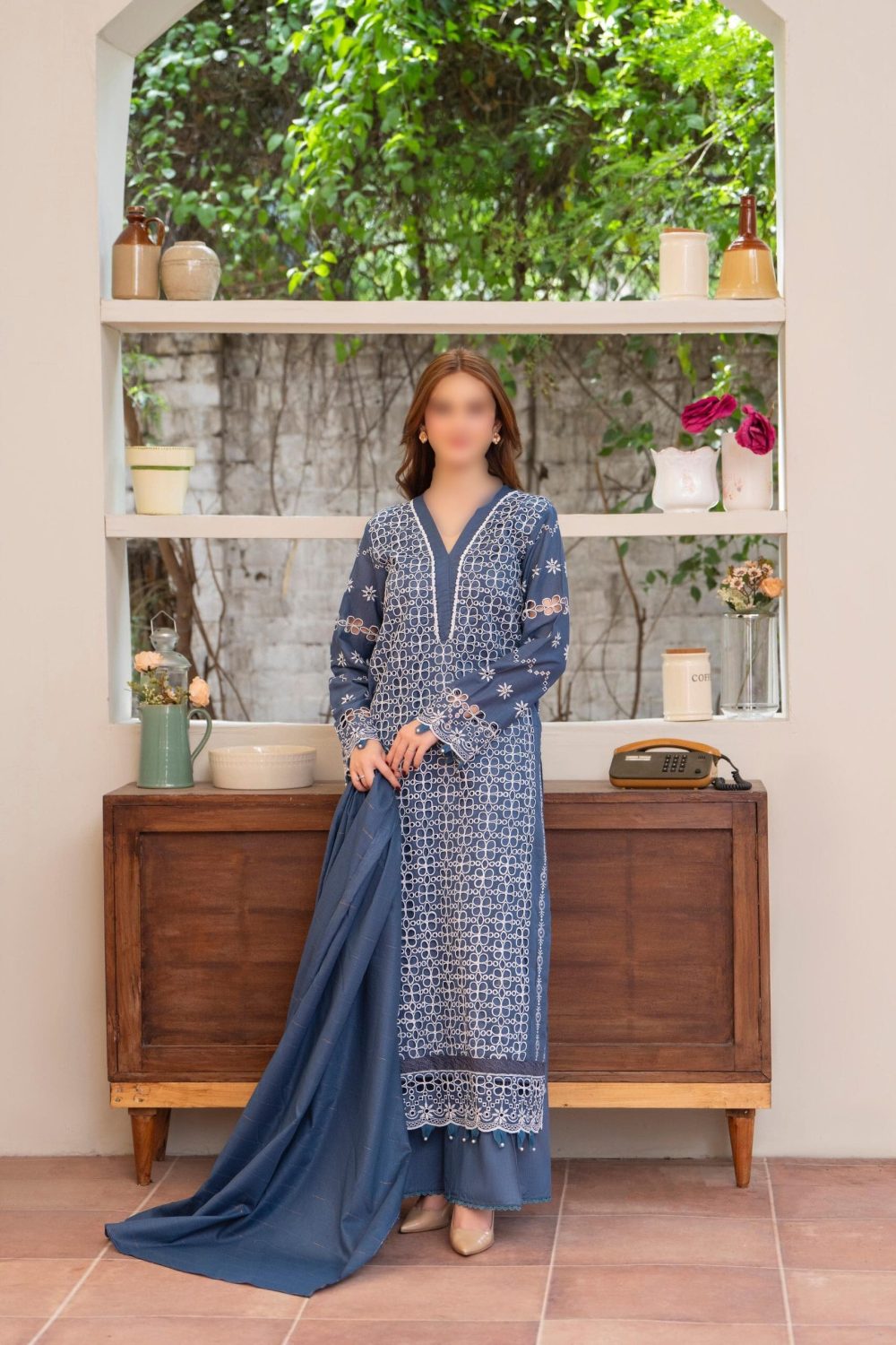 Merakhi 3PC lawn Chickenkari suit with laser-cut embroidery, embroidered sleeves, and blue slub dupatta