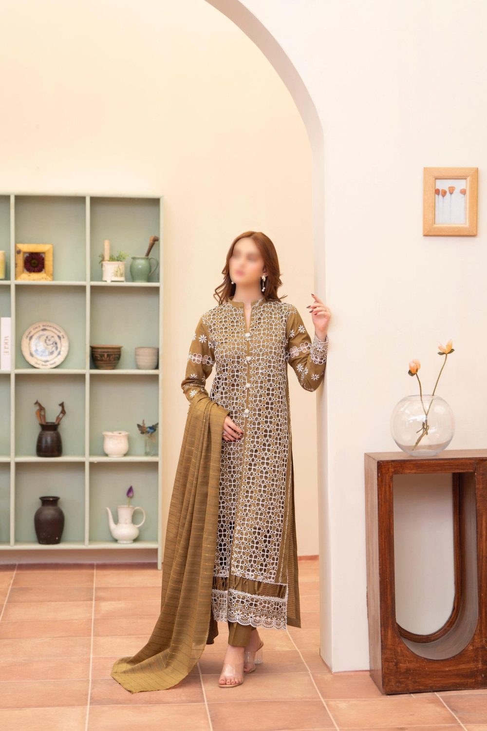 Merakhi 3PC lawn Chickenkari suit with laser-cut embroidery, embroidered sleeves, and blue slub dupatta