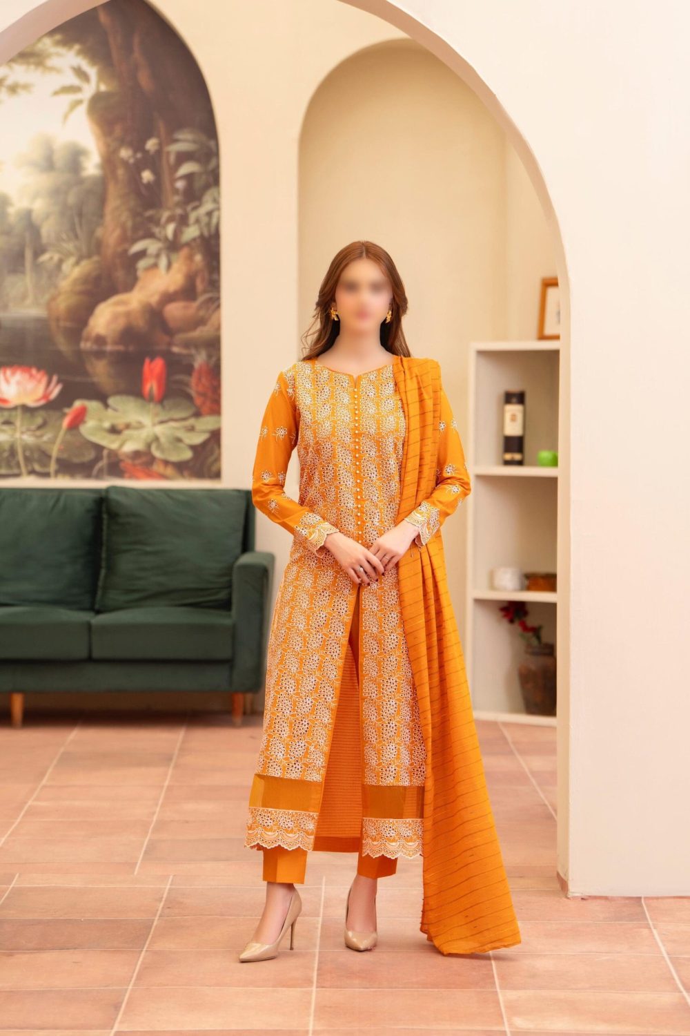Merakhi 3PC lawn Chickenkari suit with laser-cut embroidery, embroidered sleeves, and mustard slub dupatta