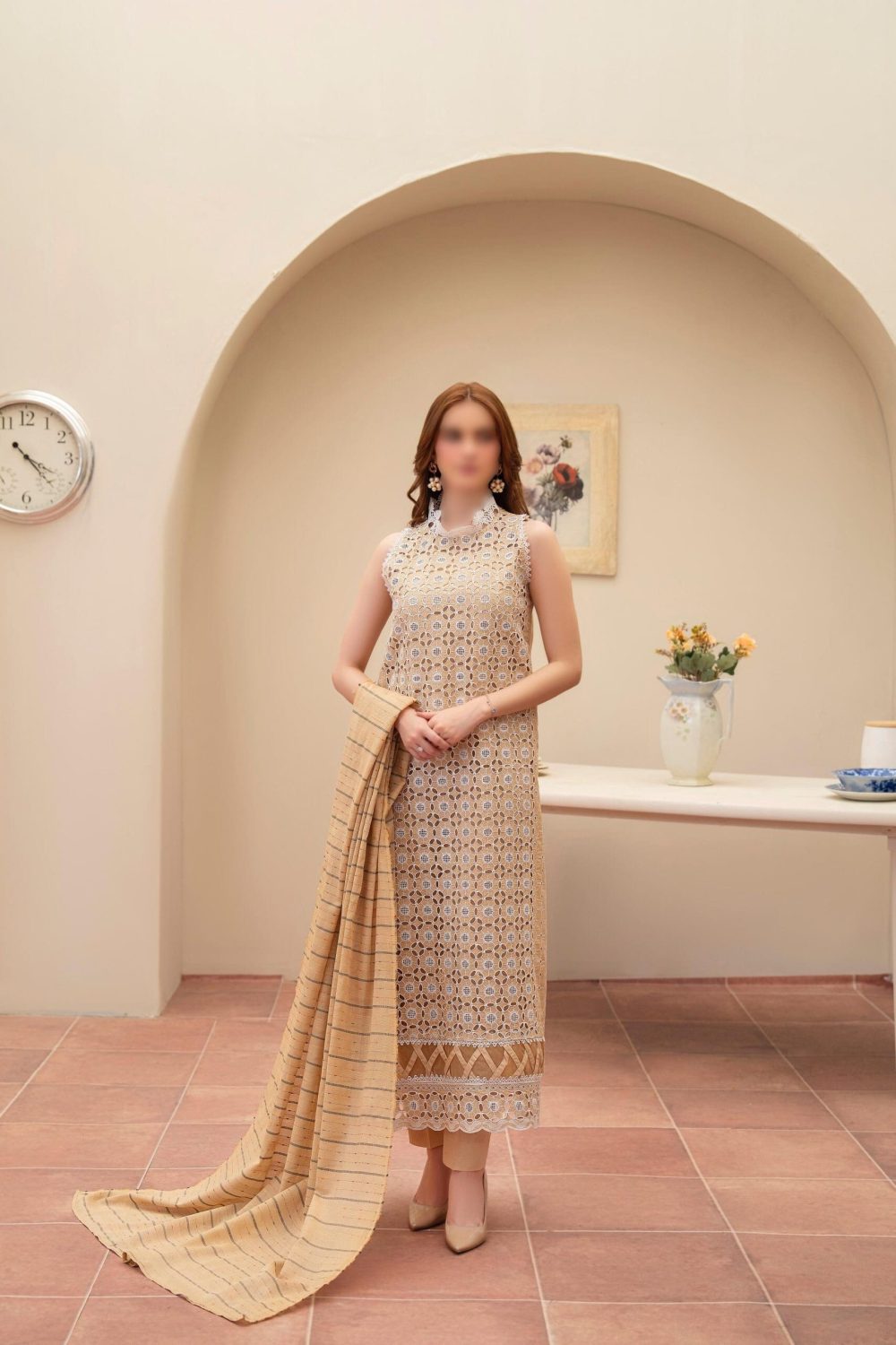 Merakhi 3PC lawn Chickenkari suit with laser-cut embroidery, embroidered sleeves, and skin slub dupatta