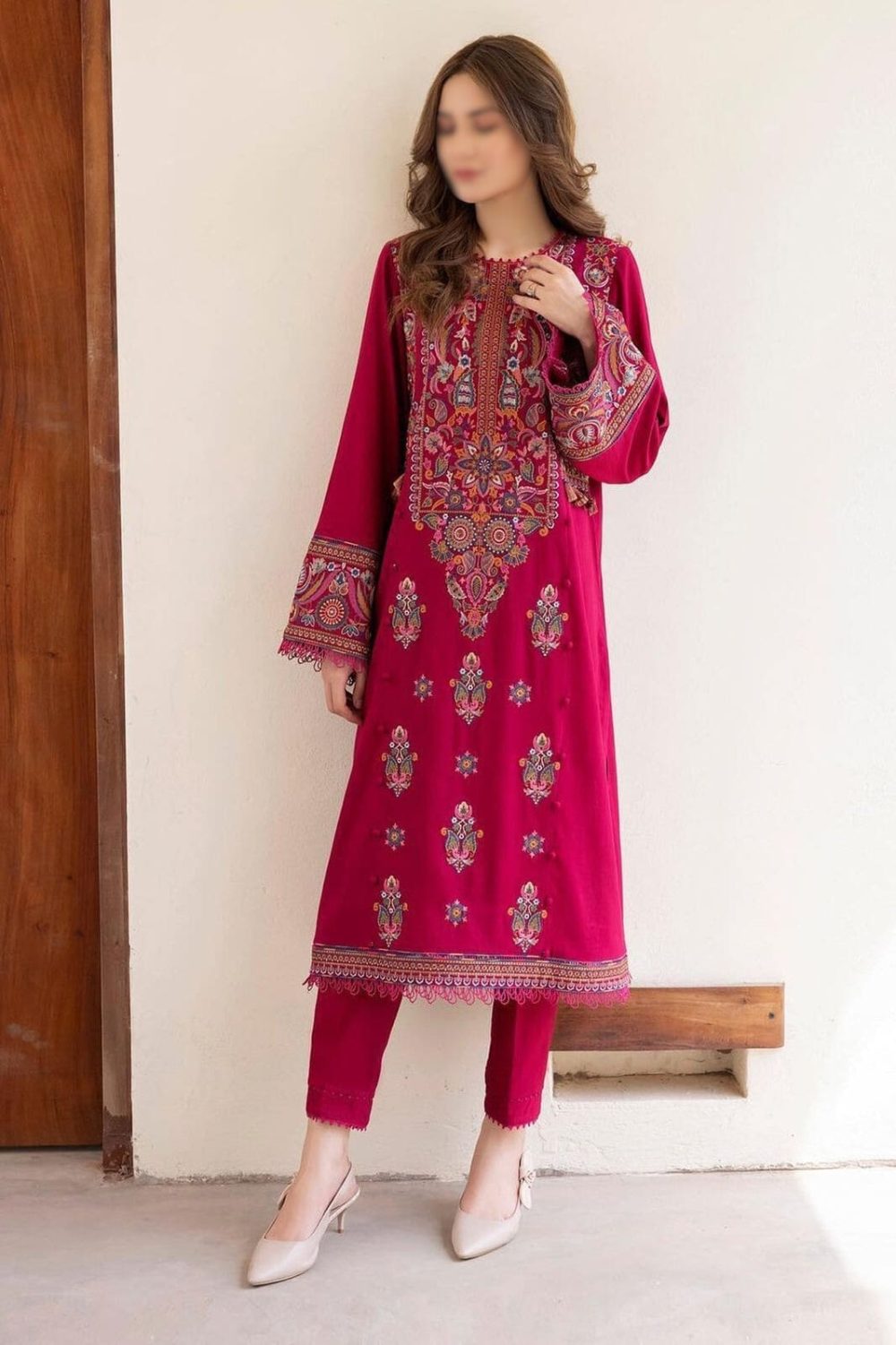 Model wearing front-open 2 piece unstitched airjet lawn suit in breathable summer fabric with printed shirt and plain trousers