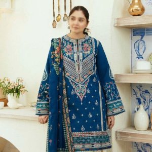 Model wearing COCO by Zara.J royal blue embroidered lawn suit styled with Tarkashi printed dupatta – Summer 2025