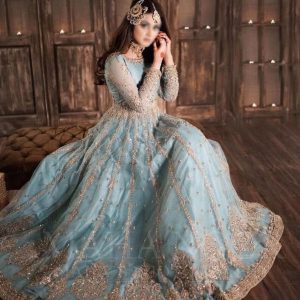 Model wearing Hira Mani inspired blush sky blue net frock with intricate embroidery and mirror work