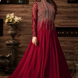 model wearing embroidered chiffon maxi suit showing details