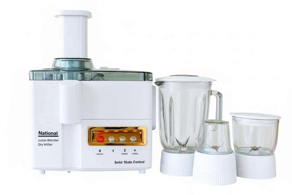 National 4-in-1 Juicer Blender Grinder Machine with copper motor, 3 glass jars on a kitchen countertop – sold by BazarPKR with 5-year warranty and free shipping